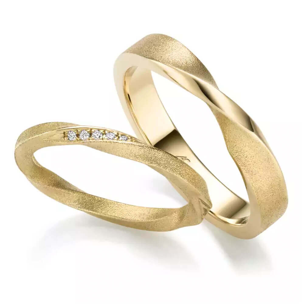 Trauringe Gelbgold gedreht 0.075 ct.